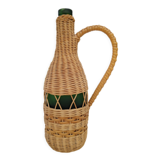 Bottle covered with woven wicker 70s