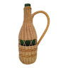Bottle covered with woven wicker 70s
