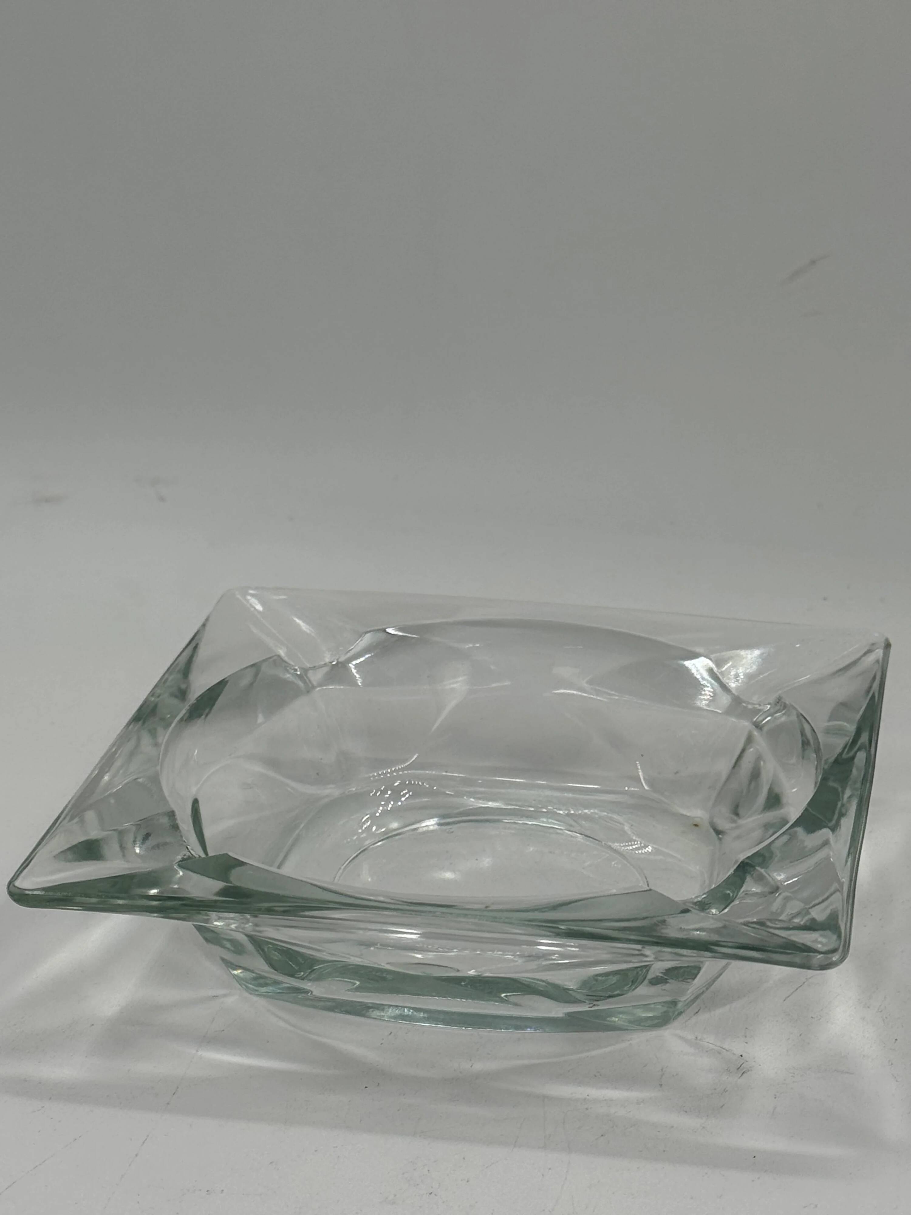 Vintage square glass ashtray, minimalist design.