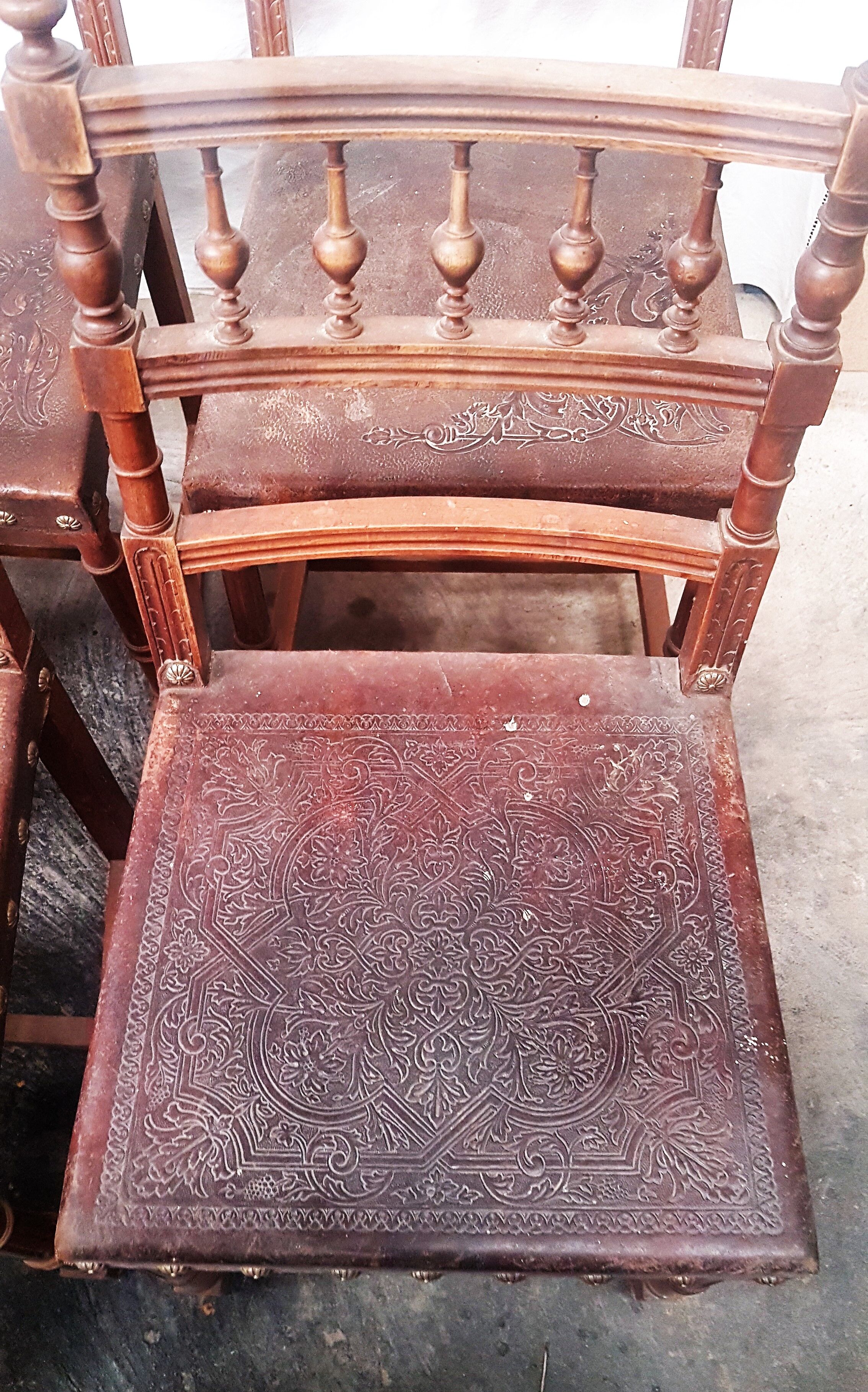 A set of 16 henri 2 style chairs in repelled leather 2 patterns