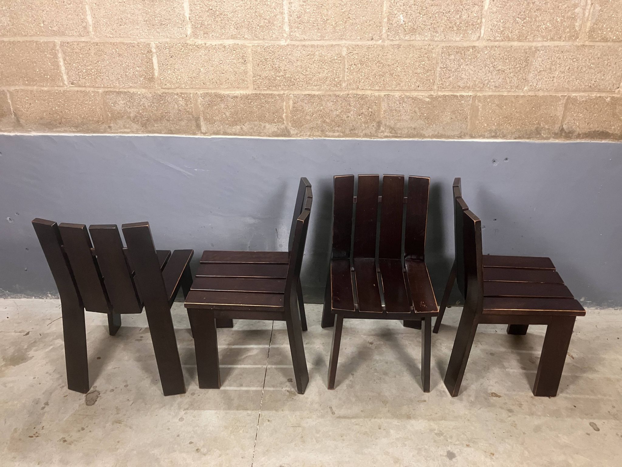 Brutalist and modernist dining chairs from the 1970s in architectural brown wood.