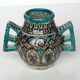 Polychrome ceramic vase in flowing enamel from Nabeul with mihrab decoration.