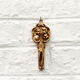Coat hanger in rococo style, fish, dragon, dutch man and woman