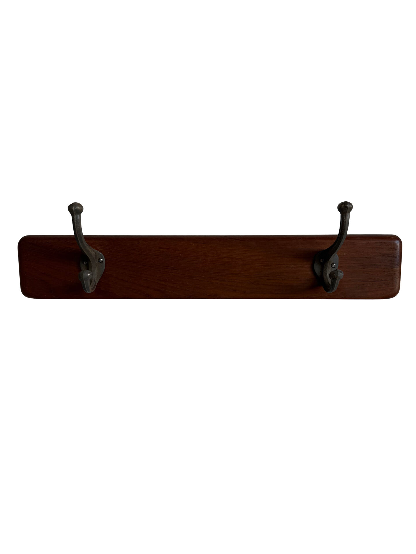 Scandinavian coat rack in solid teak from the 1970s.