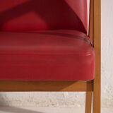 2 red armchairs, circa 1960