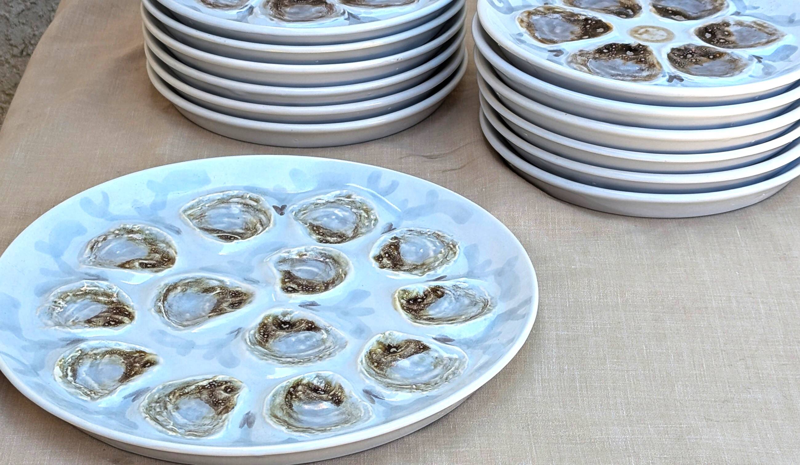 Oyster service in Saint Amand earthenware, hand-painted.