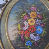 Painted under glass convex medallion in bronze