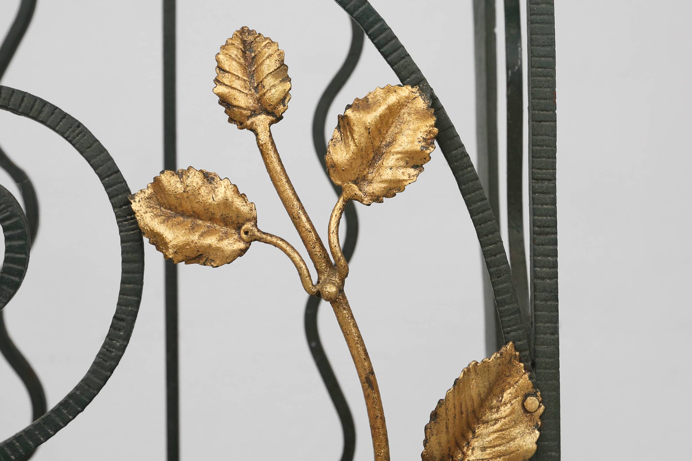 Art deco wrought iron umbrella stand with floral decoration, France ca. 1930