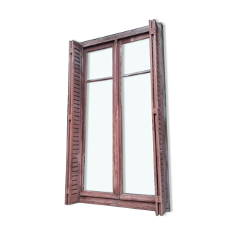 Window and shutters with louvers on frame