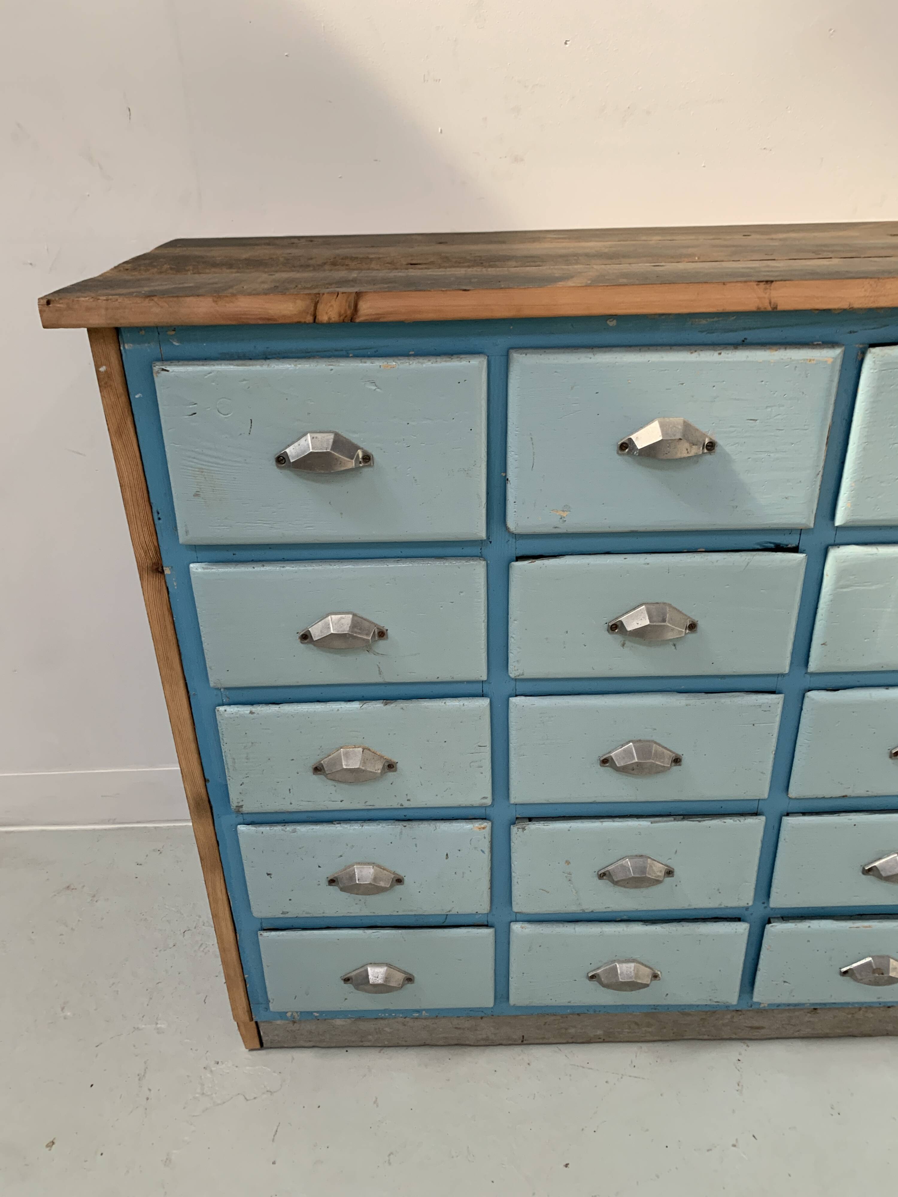 30-drawer storage unit in patinated fir, 20th century