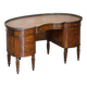 Regency style hardwood and leather kidney desk with gallery.