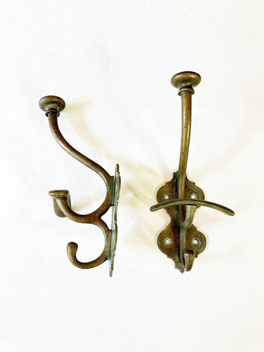 Antique patinated brass coat hooks