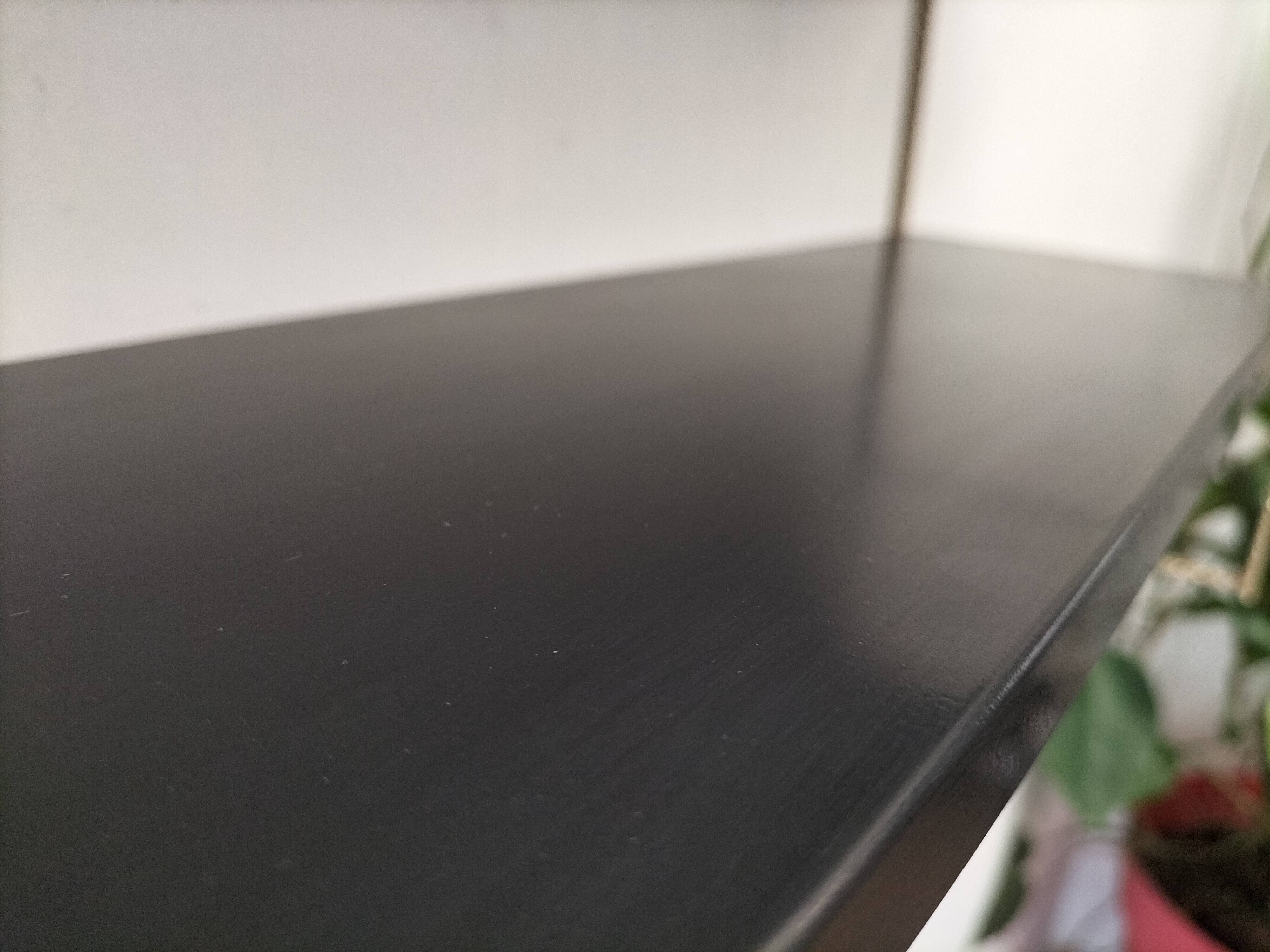 Modular black metal shelf