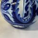Glazed ceramic carafe with floral decoration