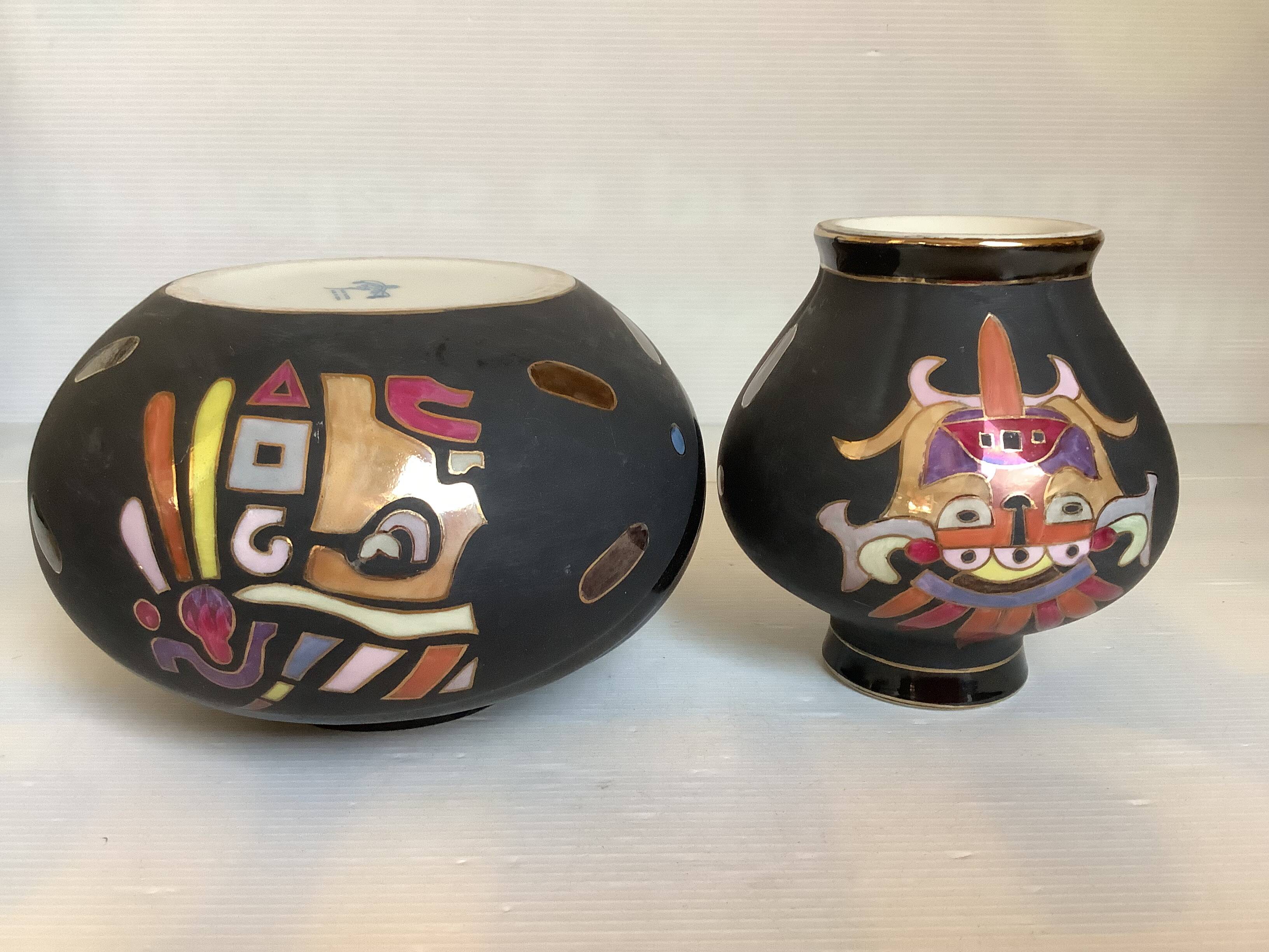 Pair of matte and glazed ceramic vases