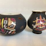 Pair of matte and glazed ceramic vases