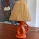 Vintage ceramic and raffia lamp
