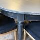 Louis XVI style extendable table in grey painted wood
