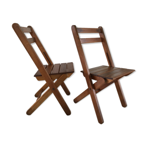 Paire de chaises pliantes au feu de bois