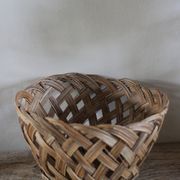 Vintage high round wicker basket with openwork.