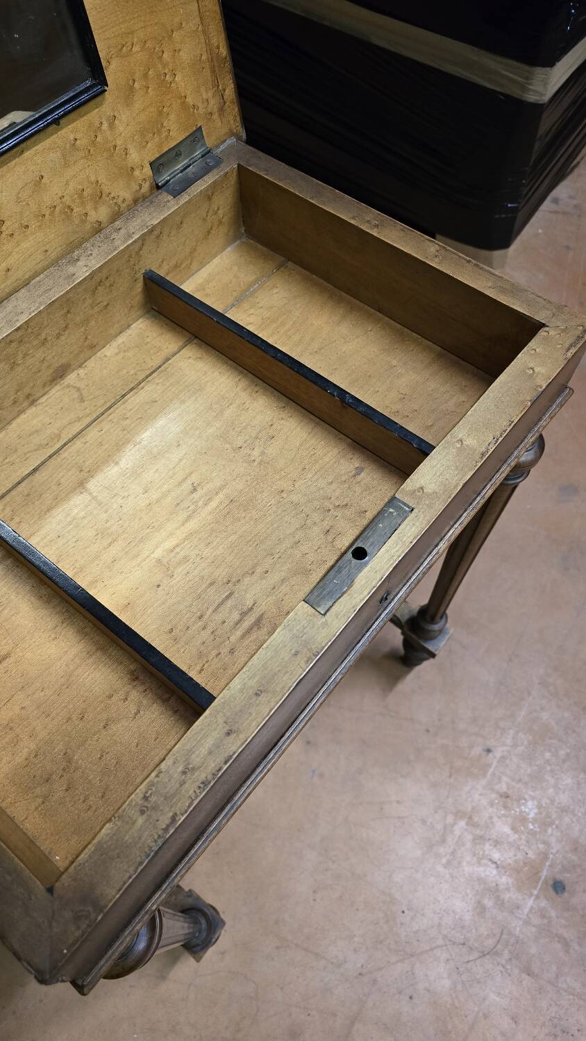 Antique wooden work table, inlaid top and interior mirror.