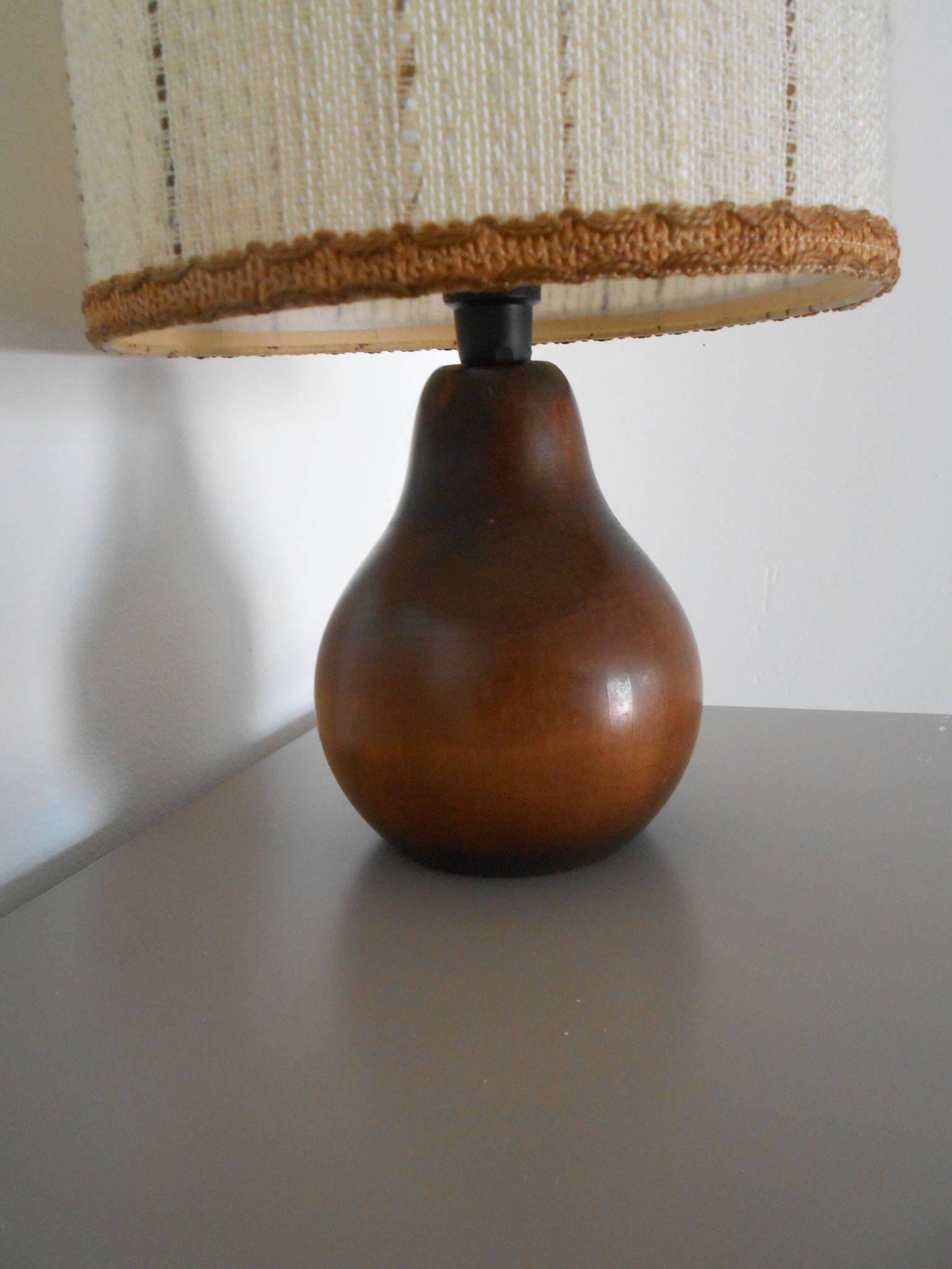 Carved wood lamp and wool yarn lampshade