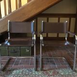 Leather and steel armchairs