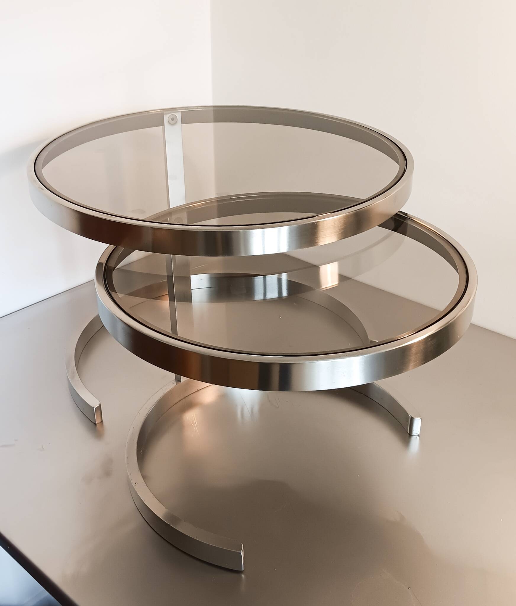 2 vintage 1970s smoked glass and brushed metal nesting coffee tables