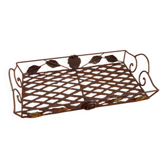 Rectangular metal serving tray with floral decoration.