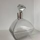 Beautiful cut crystal carafe with its stopper and solid silver setting
