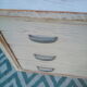 White patina low wooden commodity