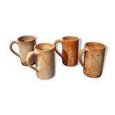 Suite of 4 sandstone mugs