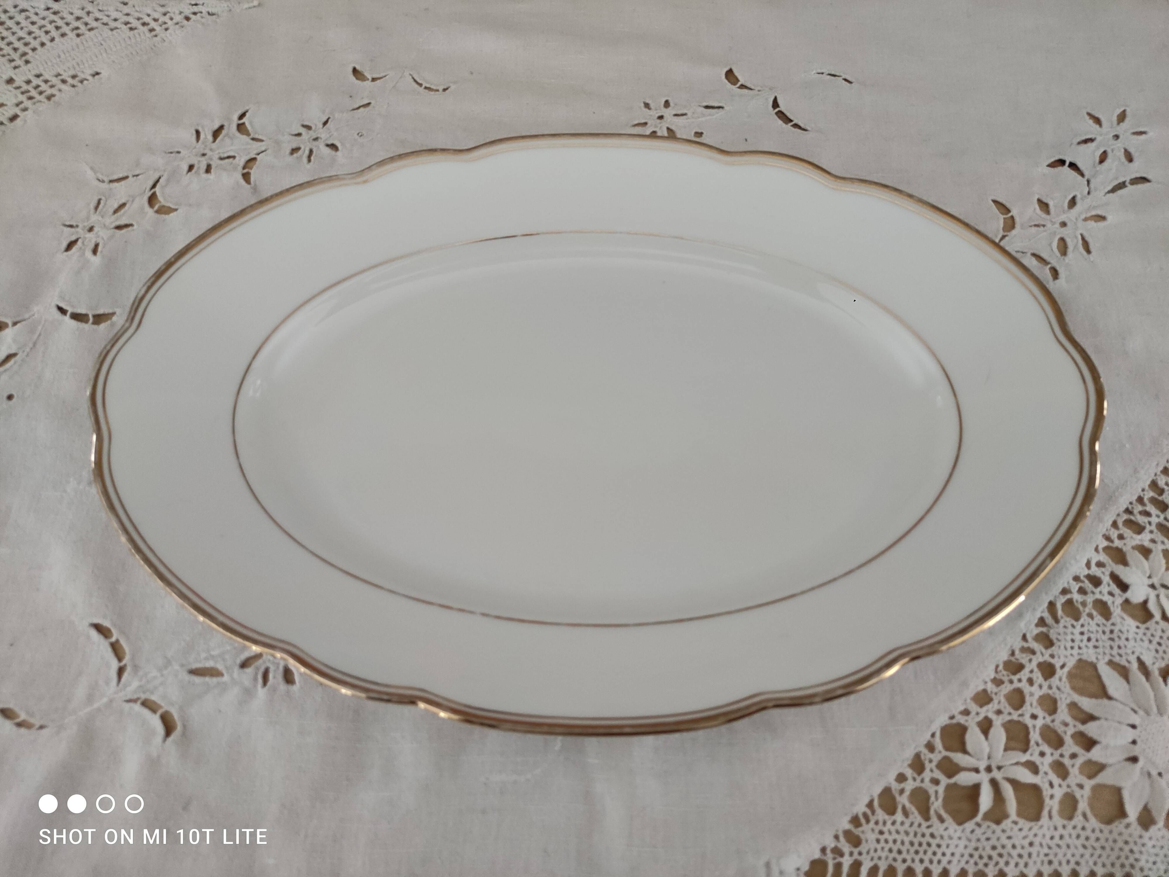 Oval plate in white Swiss porcelain double gilded border "VSK USC Viribus Unitis"