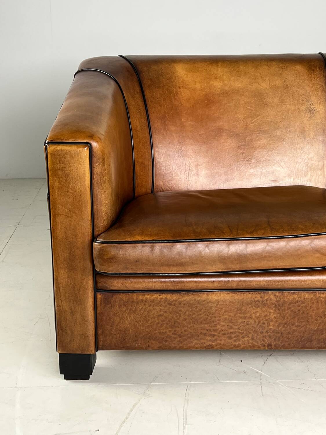 Art deco sofa sheep’s leather