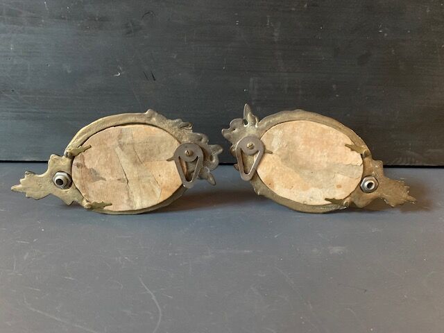 Pair of antique bronze candle holders