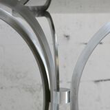 Living room table "Space Age" polished steel, circular slab smoked glass. France, circa 1970.