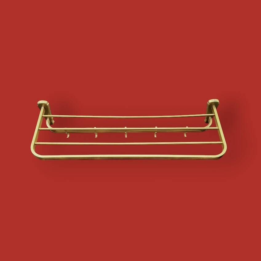 Vintage wall-mounted coat rack in anodised gold aluminium with hat holder.