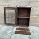 Art Deco wall display cabinet in Burmese teak with original patina.