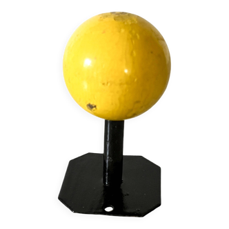 Vintage wall coat rack, metal and wood in yellow, 1 hook.