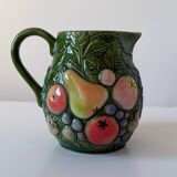 Carafe of water in slush with fruits