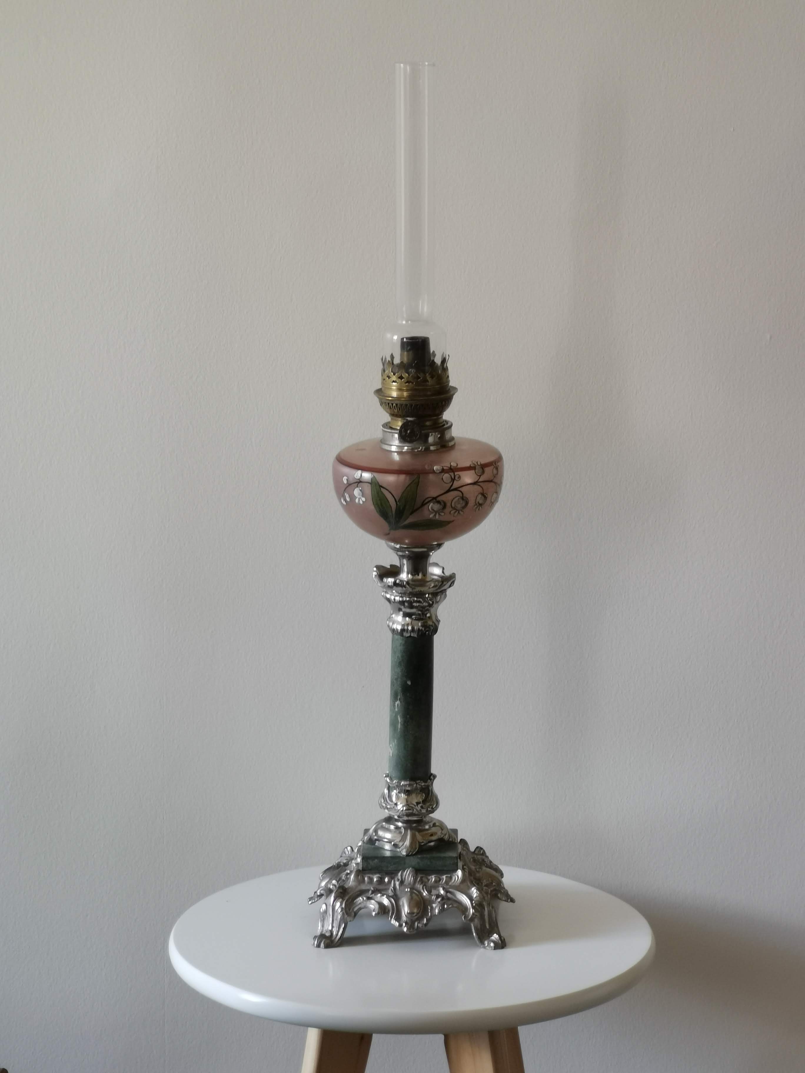 Kerosene lamp late nineteenth century mounted on Corinthian column.