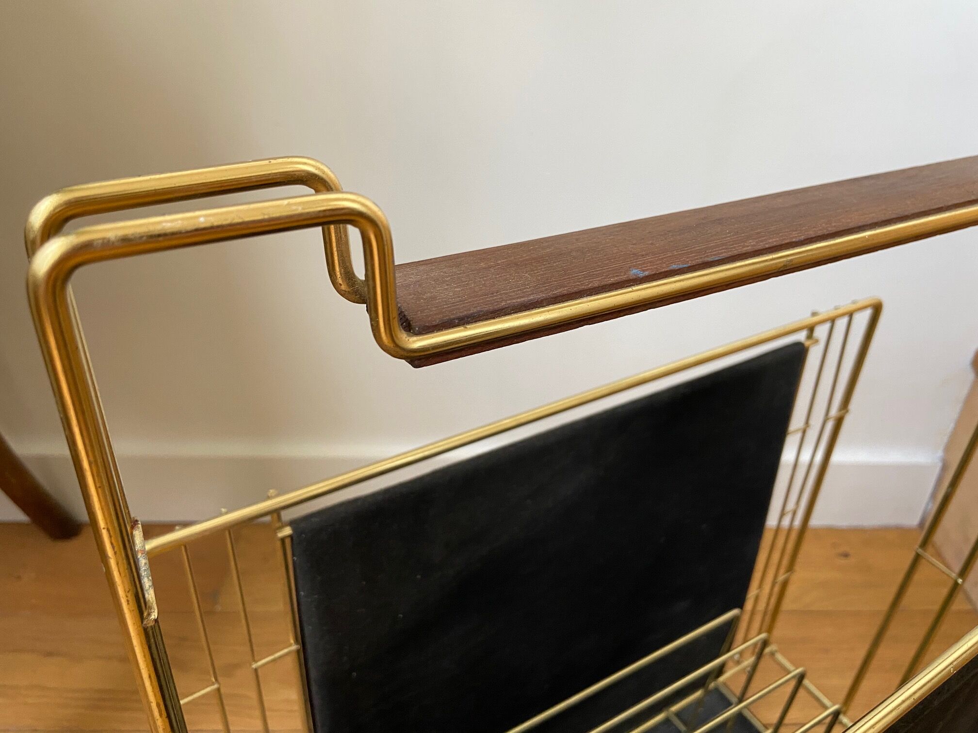 Gold metal, wood and black cotton magazine holder