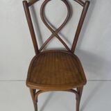 Old curved wooden bistro chair