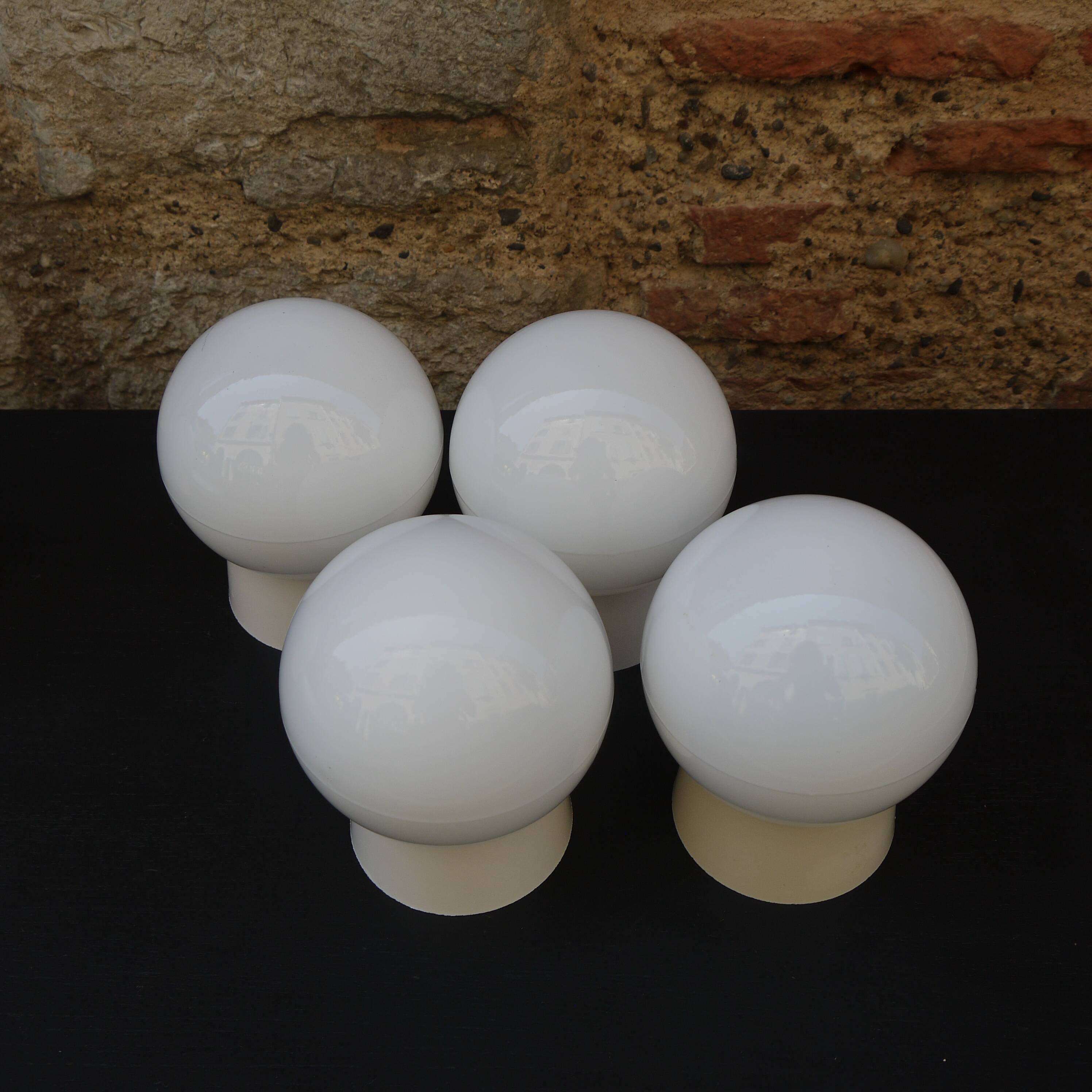 White globe sconce