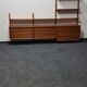 Teak wall unit by Poul Cadovious