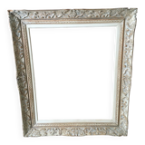 Carved wood frame.