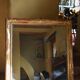 Large gilded Empire mirror from the 19th century.