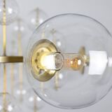 Large chandelier in gilded brass with decorative balls. 1970s.