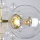 Large chandelier in gilded brass with decorative balls. 1970s.
