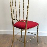 Chiavari chair and stool in brass and velvet. Around 1940.
